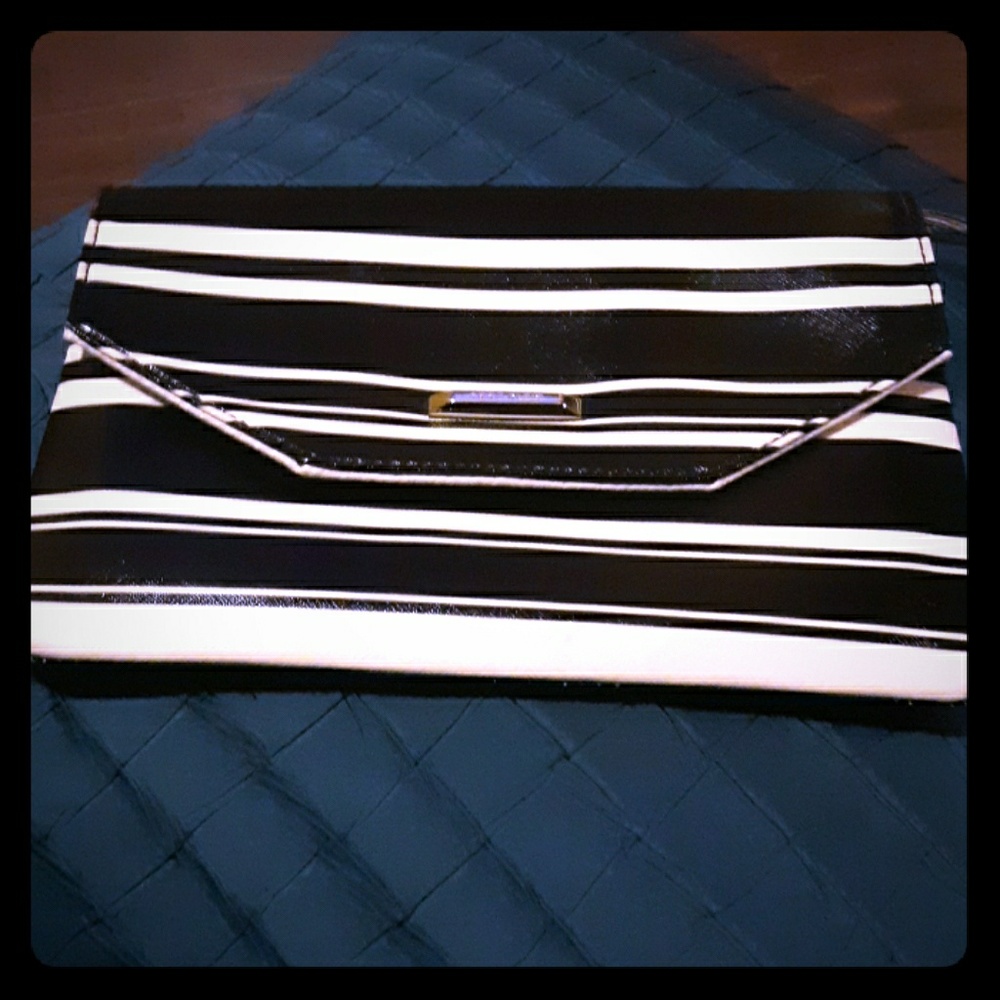 Anne Klein black and white striped wristlet.  New!